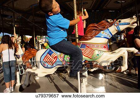 Stock Photo -  boy child kid eyes closed fear excitement serene. Fotosearch