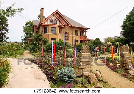 building woman female watering allen centennial View Large Photo Image Stock Image - building woman female watering allen centennial. Fotosearch