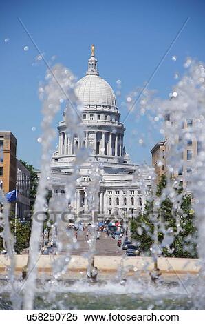 capitol seen through fountain water madison wi View Large Photo Image Stock Photography - capitol seen through fountain water madison wi. Fotosearch