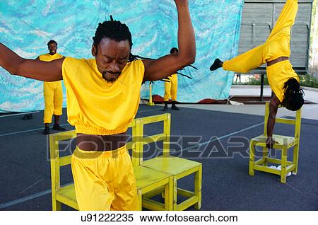 Stock Photography -  caribbean acrobat acrobatic performers skill new. Fotosearch