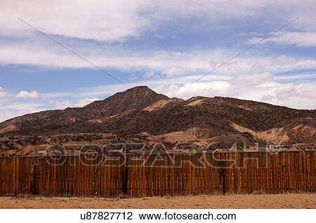 Stock Image -  cliffs bluffs mountains abiquiu new mexico nm. Fotosearch