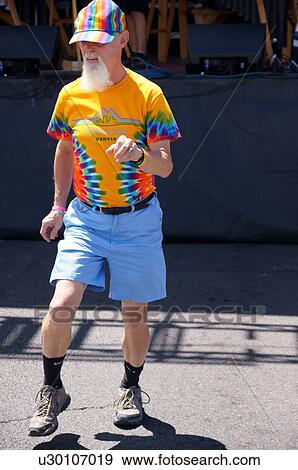 Stock Photo -  colorfully dressed man male senior citizen aged. Fotosearch