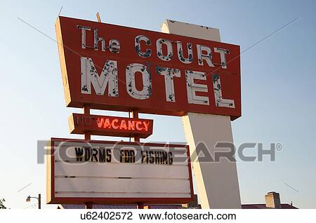 Stock Image -  court motel sign worms for fishing pharma idaho. Fotosearch