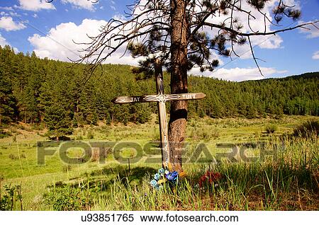 Stock Photography -  cross descansos closeup hwy 64 to taos new nm. Fotosearch