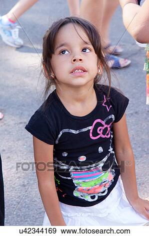 cute girl child kid latino hispanic looking up View Large Photo Image Stock Photo - cute girl child kid latino hispanic looking up. Fotosearch