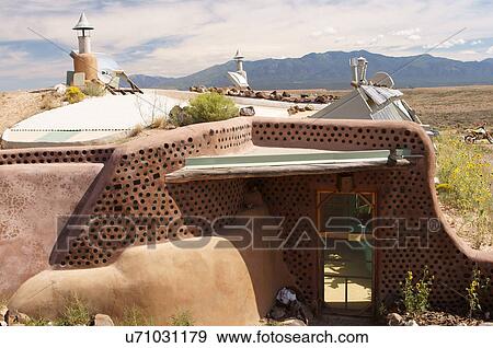 Stock Photo -  earthship biotecture biodiesel community highway. Fotosearch