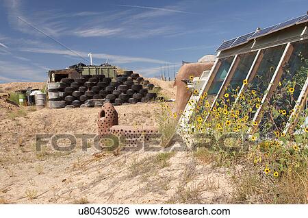 Stock Photograph -  earthship biotecture biodiesel community highway. Fotosearch
