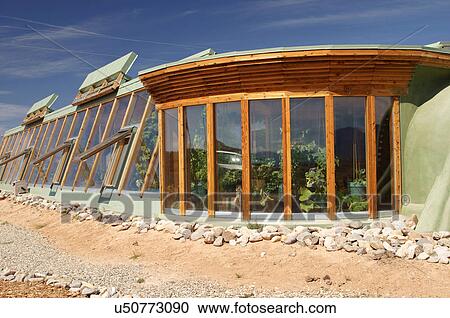 Stock Image -  earthship home house biotecture biodiesel taos. Fotosearch
