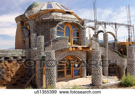 Stock Photo -  earthship home house biotecture biodiesel taos. Fotosearch
