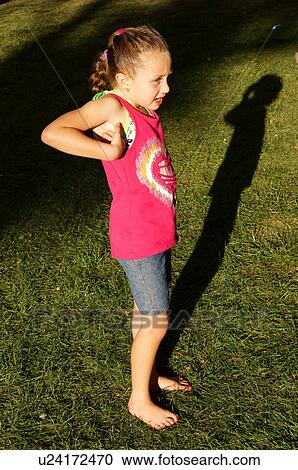 girl child kid female doing shadow pantomine on View Large Photo Image Stock Image - girl child kid female doing shadow pantomine on. Fotosearch