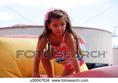 girl child kid inflatable bounce house sport View Large Photo Image Picture - girl child kid inflatable bounce house sport. Fotosearch