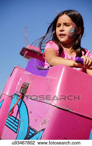 girl child kid latino hispanic on ride new state View Large Photo Image Stock Image - girl child kid latino hispanic on ride new state. Fotosearch