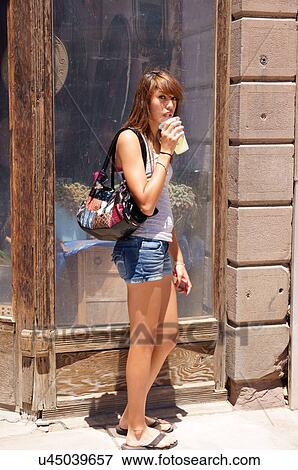 Stock Photo -  girl teen teenager street woman female people. Fotosearch