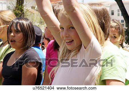 Picture -  girl teens teenagers teen teenager girls sing. Fotosearch