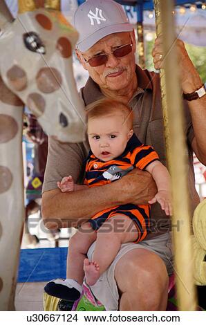grandpa male man with child kid boy grandson on View Large Photo Image Picture - grandpa male man with child kid boy grandson on. Fotosearch