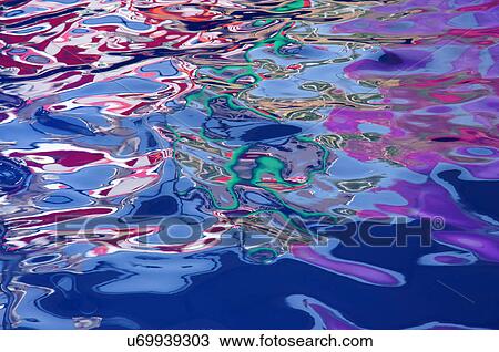 Stock Image -  graphic pattern of water ripples colorful aura. Fotosearch