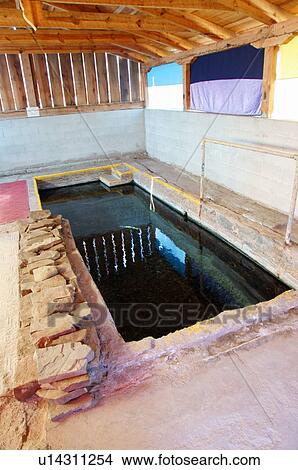 Picture -  indoor hot springs pool bath truth or nm new. Fotosearch
