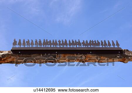 Stock Photography -  iron ranch gate highway 64 new mexico nm cowboys. Fotosearch