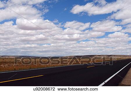 Stock Image -  landscape hwy 84 highway new mexico nm blacktop. Fotosearch