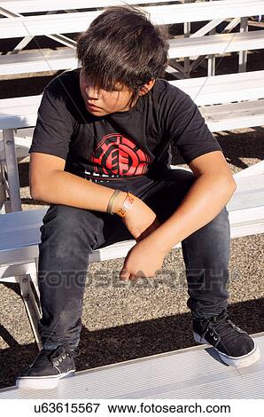 latino hispanic boy child kid sad dejected alone View Large Photo Image Stock Photo - latino hispanic boy child kid sad dejected alone. Fotosearch