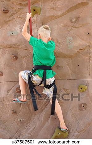 little boy child kid rock climbing climb skill View Large Photo Image Stock Image - little boy child kid rock climbing climb skill. Fotosearch