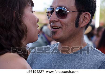 Stock Photo -  love couple dance man male woman female latino. Fotosearch