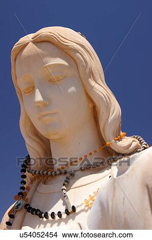 Picture -  madonna statue virgin de guadalupe at lady of. Fotosearch