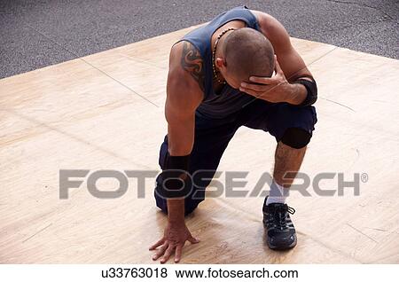 Stock Photo -  man male break dancing love regard respect lim. Fotosearch