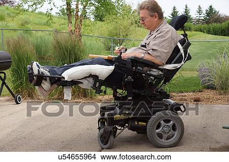 Picture -  man male in wheelchair disabled vertical care. Fotosearch
