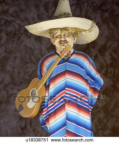 Stock Image -  man male mex sombrero guitar mexican hispanic az. Fotosearch