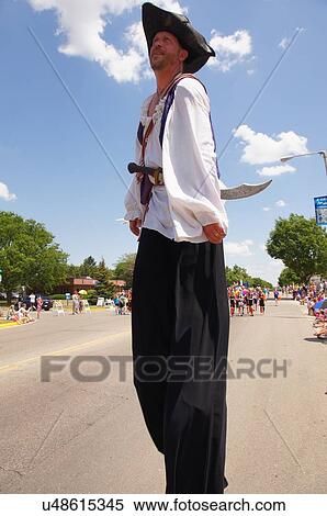 Stock Photography -  man male stilts patriot costume verona day. Fotosearch