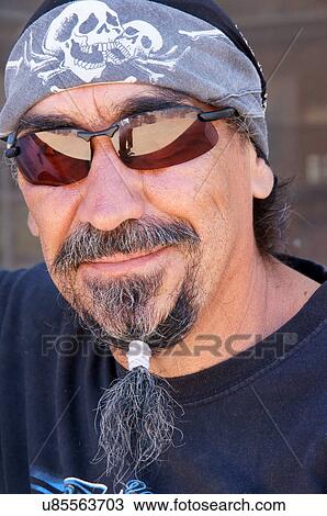 Stock Image -  man male with beard glasses bandana head scarf. Fotosearch