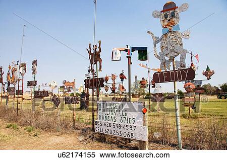Stock Photography -  mt liggetts political satire metal sculpture ks. Fotosearch
