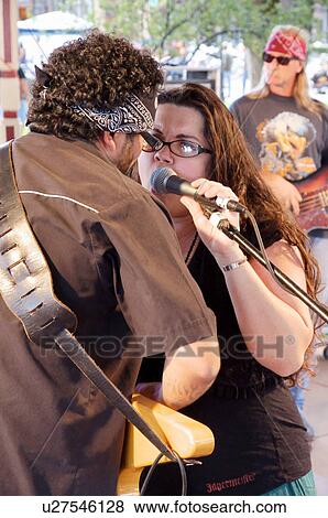 Stock Photo -  music singing man male female band stage las new. Fotosearch