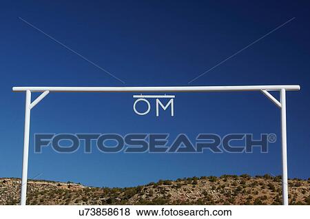 Stock Photo -  om ranch gate los montoyas new mexico brand. Fotosearch