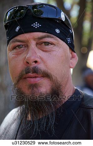 Stock Photo -  portrait headshot of biker shot las vegas new. Fotosearch
