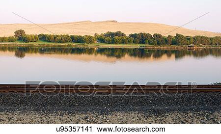 Stock Image -  railraod rail farm scene river washington wa. Fotosearch