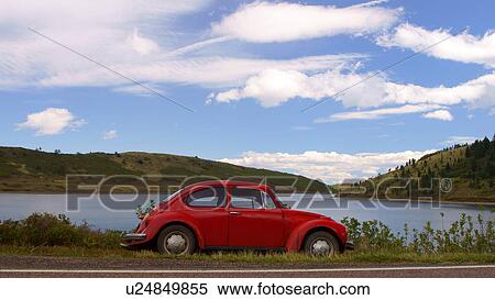 red vw volkswagen beetle bug lake monument 12 View Large Photo Image Stock Photography - red vw volkswagen beetle bug lake monument 12. Fotosearch