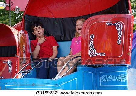 Stock Image -  ride children kids scared frightened scream yell. Fotosearch