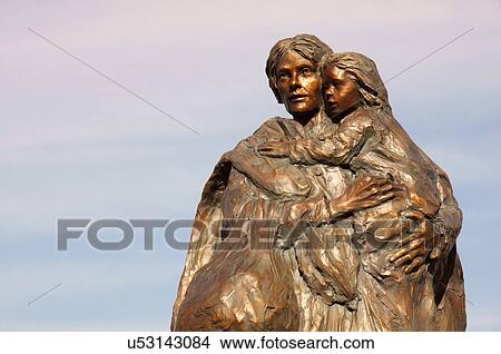 Picture -  route 66 bronze statue mother child kid water. Fotosearch