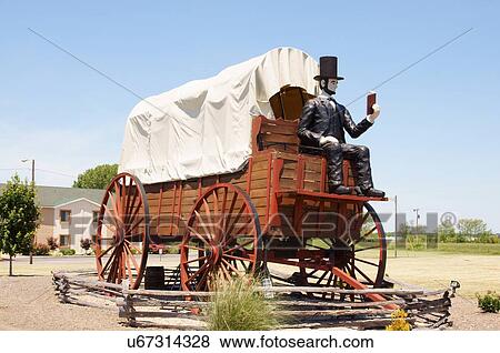 Stock Photo -  route 66 largest covered wagon world abraham. Fotosearch