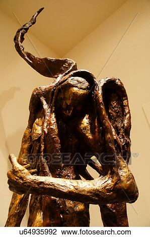 Stock Image -  santa fe nm art bronze man male figure serpent. Fotosearch