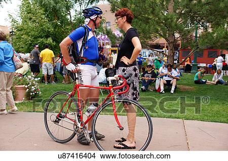 Picture -  santa fe nm couple talk bike biking man male. Fotosearch
