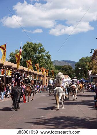 Stock Photo -  santa fe nm crowd wathcing parade horses new. Fotosearch