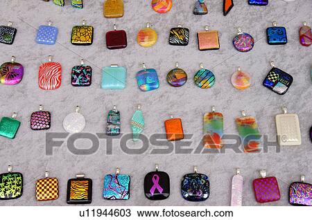 Stock Image -  santa fe nm display dichroic glass pendants. Fotosearch