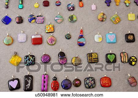 Stock Image -  santa fe nm display dichroic glass pendants. Fotosearch