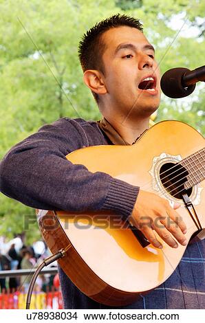 Picture -  santa fe nm man male singing latino hispanic. Fotosearch