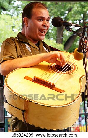 Stock Photo -  santa fe nm man male singing latino hispanic. Fotosearch