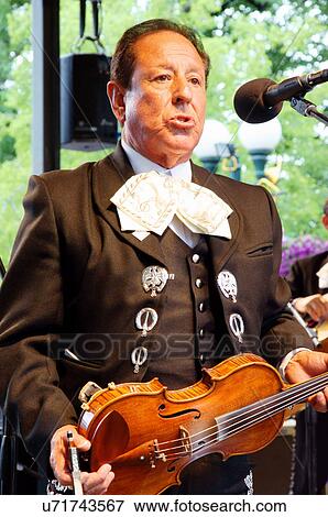 Stock Photo -  santa fe nm singer violinist mariachi folk music. Fotosearch