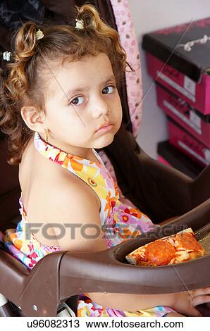 Stock Image -  smug latino hispanic girl baby el paso tx texas. Fotosearch